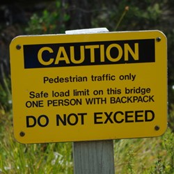 sign at a footbridge in Mt Field National Park Tasmania