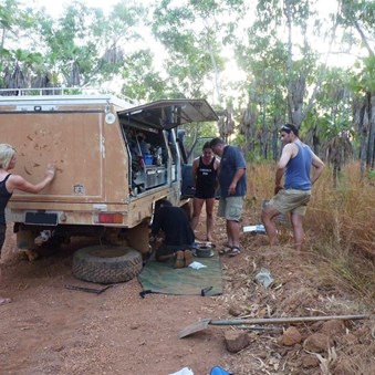 Vik painting us a "Good Luck" wanjana - She's a great help!