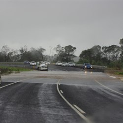flood water over the Highway south of Pambula