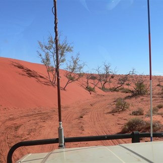 Loose sand encroaching on the track