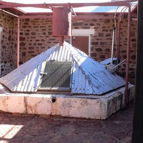 Covered water tank in the courtyard