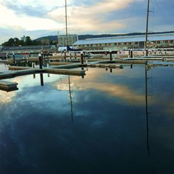 We awoke to see the mast reflections on the water