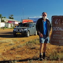 John with a sign at Oodnadatta