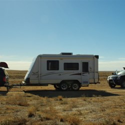 our two rigs parked beside the track north of Marree