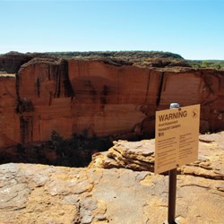 warning sign on the Canyon rim