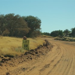 sign on drum along the road