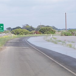 Main Road out of Kingscote flooded from the previous nights heavy rain