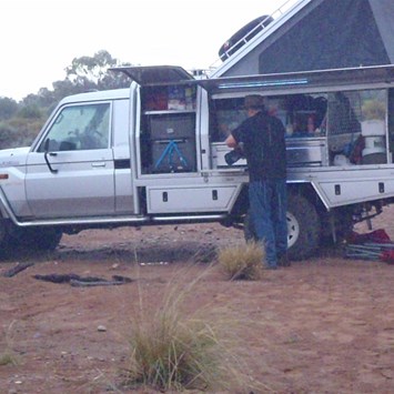 And down comes the rain - Sheltering at the tuck-truck