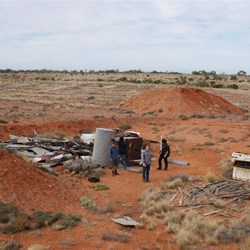 The boys explorong the dump