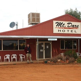 Yours truly outside the Mt Dare Pub, refreshing beverage 'inn' hand