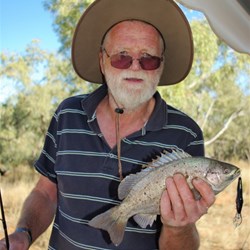 John with his catch at the Burke River near Boulia
