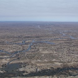 From here the Cooper snakes its way to Lake Eyre in the distance
