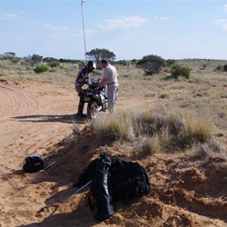 Helping Hideya getting his bike back up