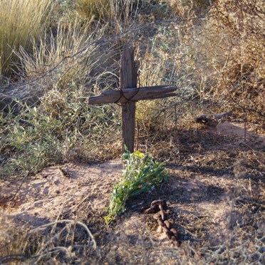 It was a very sad time when Fiona placed the flowers on the grave