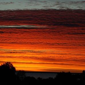 A magnificent sunrise across the waters of Moonda Lake