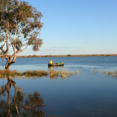 John boating on Cooper Creek
