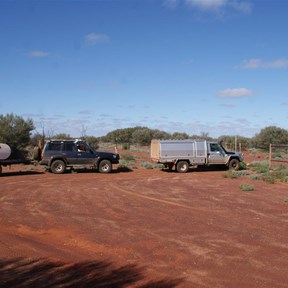 Our GDEC convoy at the Dingo Fence Gate that marks the border of the Tallaringa Conservation Park