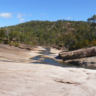 The creek has worn huge areas of bare granite