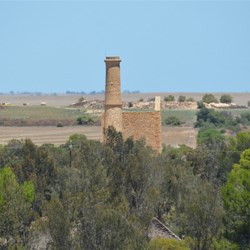 Hughes Enginehouse ruins from the tailing dump at the Richmans site