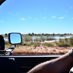 water lying beside road
