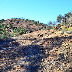 walking up the rocky conglomerate from the creek floor