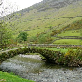 tiny bridge with rock walls