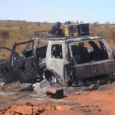 Burnt out wreckage of a Ford Explorer 