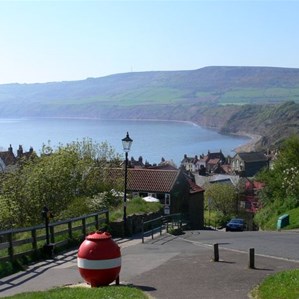 The road descends to Robin Hood Bay