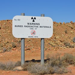 Warning sign at the burial pits