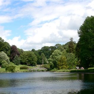 Part of the gardens at Stourhead, complete with lake, bridges and spires