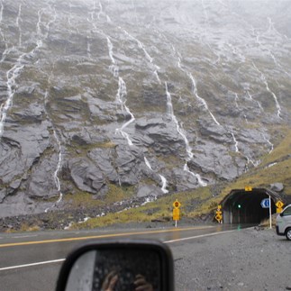 Rain pouring off the Homer Pass