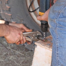 Drilling the tow hitch bolt