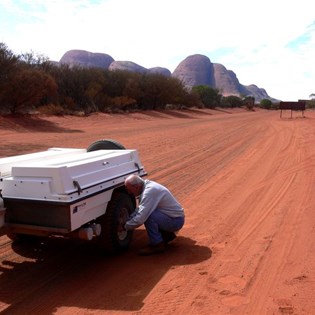 Airing down. Notice the big camel prints just behind John