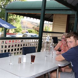 Enjoying the veranda of the Buchan Hotel