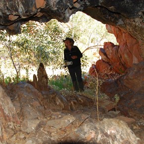 Suzette exploring the cave entrance