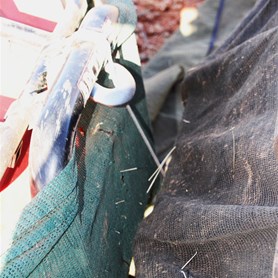 Winch cable attached to Squeaky's bar work