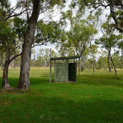 The old drop toilet still in use