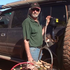 John and the 44 gallon Tanami pump in action at Well 23