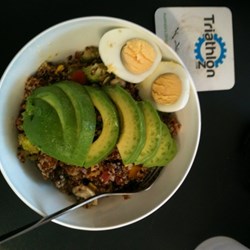 Quinoa salad served with eggs and avocado