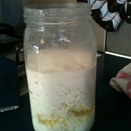 A jar of kefir ready to strain