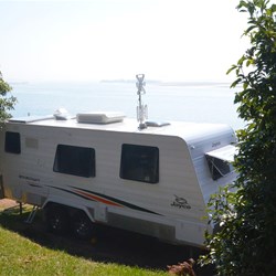 our van situated close to the water