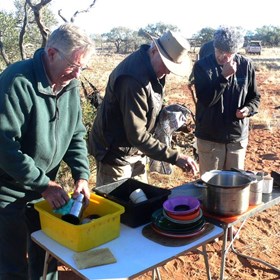 Many hands made light work of washing up.