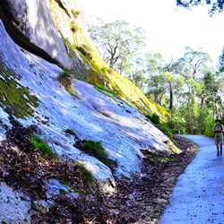 walking alongside the wet rock