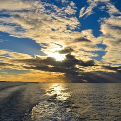 sunset from the stern of the ferry