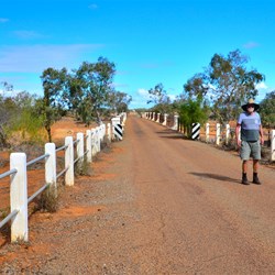 walking across the bridge