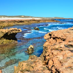 clear water and coastline near the campground