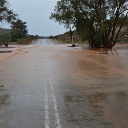 The first of many flooded crreks over the Main Highway