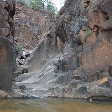 Large pool of water at the Engravings site