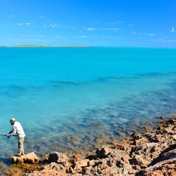 John fishing from the rocks.