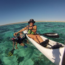 The kids show mum a starfish